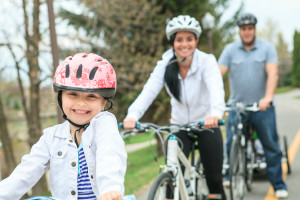 A Family having fun on bikes on spring season