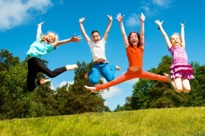 Happy active children jumping